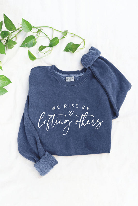 WE RISE BY LIFTING OTHERS Mineral Graphic Sweatshirt