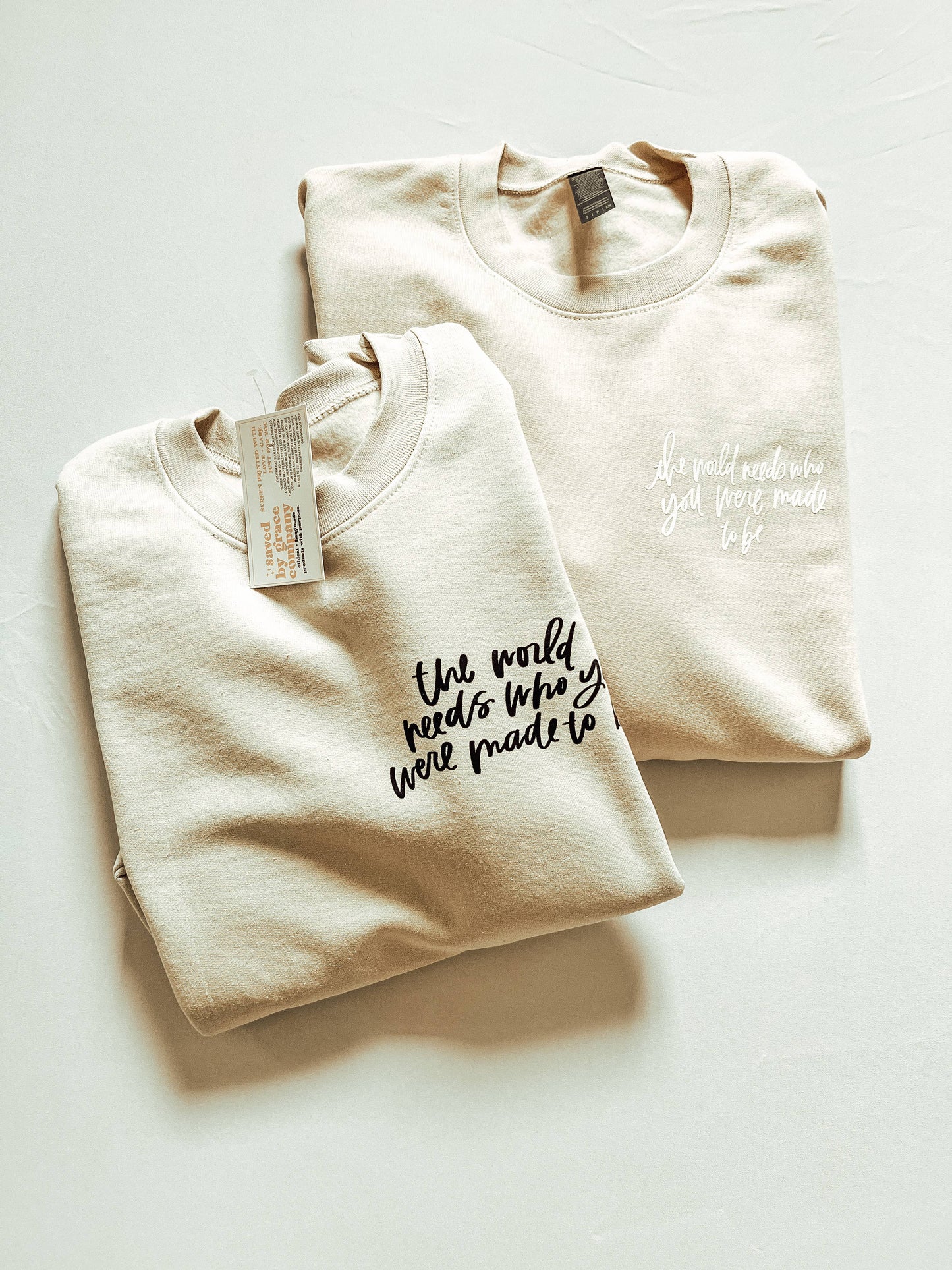 The World Needs Sweatshirt