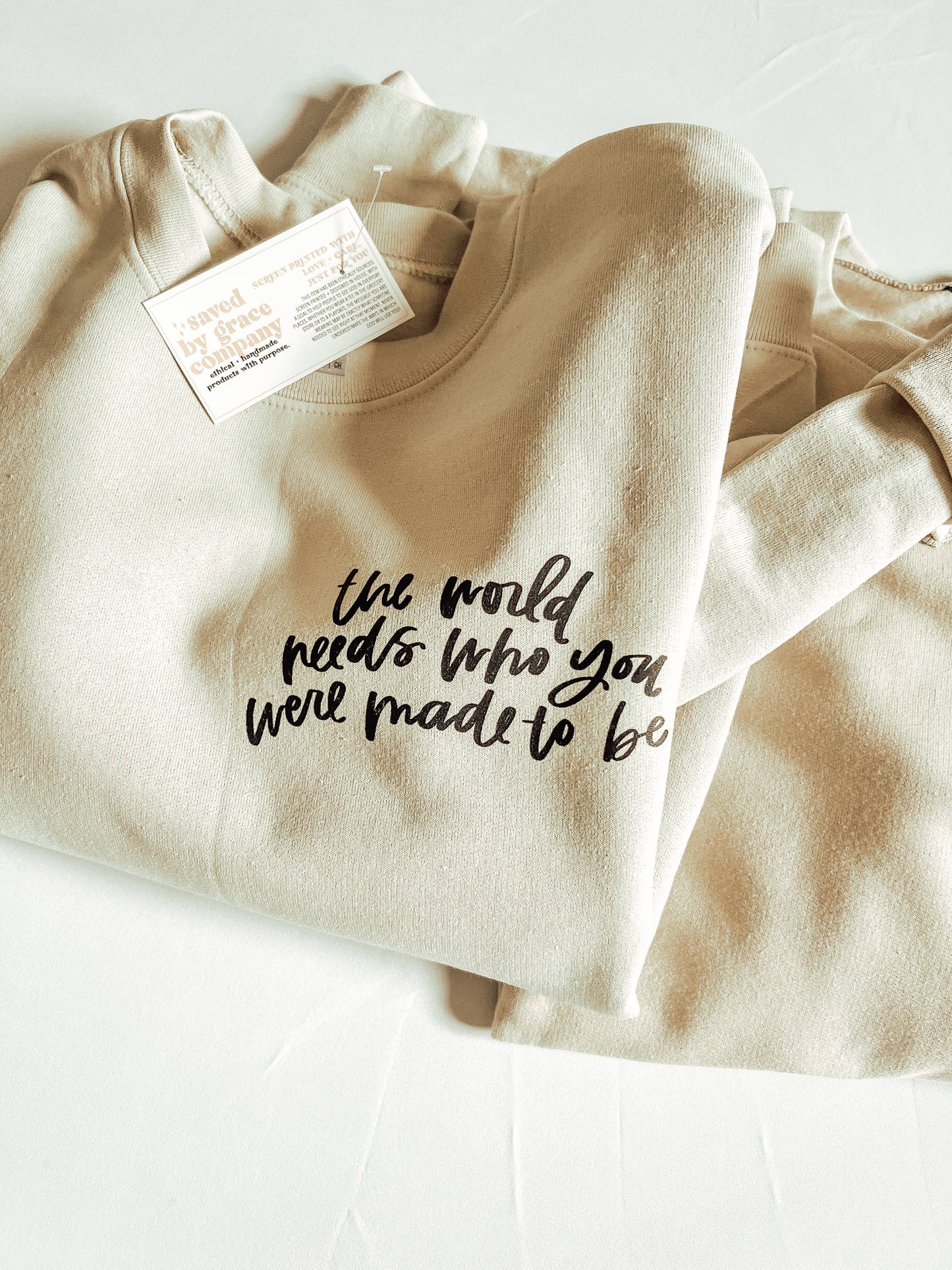 The World Needs Sweatshirt